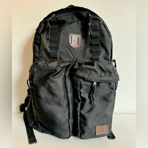 Brixton Canvas Tactical Black and Tan Backpack Full Sized Adjustable Briefcase
